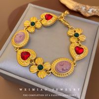 Retro Heart Shape Flower Metal Inlay Artificial Gemstones Women's Bracelets Earrings Necklace main image 2