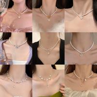 Wholesale Jewelry Ins Style Elegant Heart Shape Flower Bow Knot Imitation Pearl Alloy Necklace main image 1