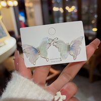 Ins Style Sweet Butterfly Mixed Materials Inlay Rhinestones Women's Ear Studs main image 3