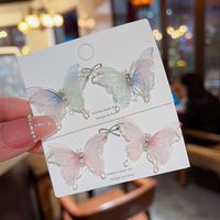 Ins Style Sweet Butterfly Mixed Materials Inlay Rhinestones Women's Ear Studs main image 1