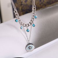 Casual Simple Style Round Devil's Eye Titanium Steel Plating Inlay Turquoise Rhinestones Layered Necklaces main image 4