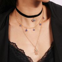 Ethnic Style Modern Style Devil's Eye Palm Fabric Zinc Alloy Plating Hollow Out Inlay Turquoise Rhinestones Women's Layered Necklaces main image 7