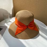 Women's Vacation Solid Color Bowknot Big Eaves Straw Hat sku image 3