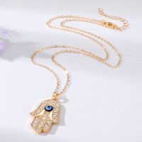 Casual Cool Style Devil's Eye Palm Heart Shape Alloy Hollow Out Inlay Rhinestones Women's Pendant Necklace main image 3