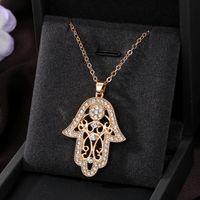 Casual Cool Style Devil's Eye Palm Heart Shape Alloy Hollow Out Inlay Rhinestones Women's Pendant Necklace main image 2