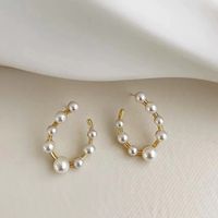 Simple Style U Shape Alloy Inlay Artificial Pearls Women's Ear Studs main image 4