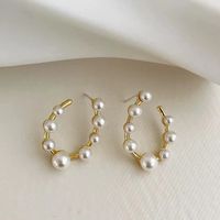 Simple Style U Shape Alloy Inlay Artificial Pearls Women's Ear Studs main image 6