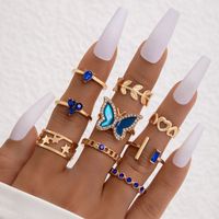 Glam Commute Heart Shape Petal Butterfly Alloy Inlay Artificial Gemstones Artificial Crystal Women's Rings main image 1