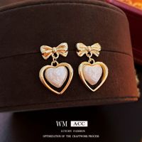 Elegante Oval Forma De Corazón Rosa Aleación Embutido Perlas Artificiales Diamantes De Imitación Mujeres Aretes sku image 40