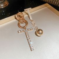 Estilo Simple Letra Metal Embutido Diamantes De Imitación Mujeres Pendientes De Gota sku image 7