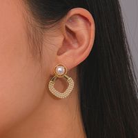 Elegant Starfish Flower Bow Knot Alloy Plating Inlay Artificial Pearls Rhinestones Gold Plated Women's Earrings main image 10