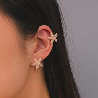 Elegant Starfish Flower Bow Knot Alloy Plating Inlay Artificial Pearls Rhinestones Gold Plated Women's Earrings main image 6