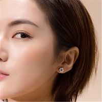 1 Pair Simple Style Flower Copper Plating Inlay Zircon Ear Studs main image 4