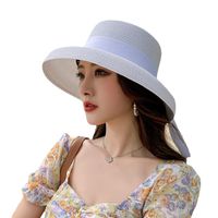 Women's Classic Style Bow Knot Braid Curved Eaves Straw Hat main image 3