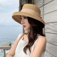Women's Classic Style Bow Knot Braid Curved Eaves Straw Hat main image 1