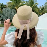 Women's Classic Style Bow Knot Braid Curved Eaves Straw Hat sku image 2