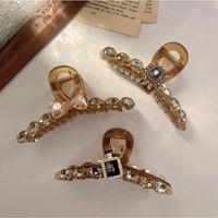 Casual Bow Knot Snowflake Perfume Bottle Alloy Plastic Inlay Rhinestones Pearl Hair Claws main image 4