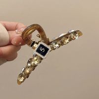 Casual Bow Knot Snowflake Perfume Bottle Alloy Plastic Inlay Rhinestones Pearl Hair Claws sku image 1
