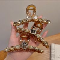 Casual Bow Knot Snowflake Perfume Bottle Alloy Plastic Inlay Rhinestones Pearl Hair Claws main image 1