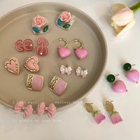 Sweet Peach Heart Shape Flower Arylic Alloy Plating Inlay Artificial Pearls Resin Rhinestones Women's Earrings main image 1