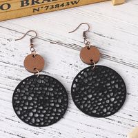 1 Pair Ethnic Style Round Patchwork Hollow Out Stainless Steel Wood Drop Earrings main image 5