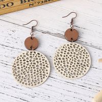 1 Pair Ethnic Style Round Patchwork Hollow Out Stainless Steel Wood Drop Earrings main image 3