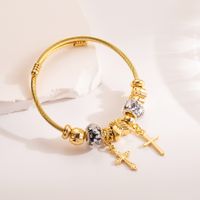 Casual Modern Style Cross Devil's Eye Palm Alloy Titanium Steel Plating Hollow Out Inlay Rhinestones Gold Plated Women's Bangle main image 3
