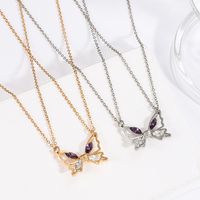 Simple Style Butterfly Alloy Plating Hollow Out Inlay Rhinestones Women's Pendant Necklace Long Necklace main image 1
