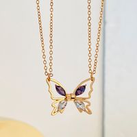 Simple Style Butterfly Alloy Plating Hollow Out Inlay Rhinestones Women's Pendant Necklace Long Necklace main image 2