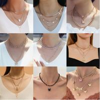 Casual Lady Star Moon Butterfly Alloy Metal Brass Plating Inlay Rhinestones Pearl Zircon 18k Gold Plated Gold Plated Silver Plated Layered Necklaces Long Necklace Necklace main image 1