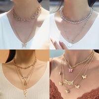 Casual Lady Star Moon Butterfly Alloy Metal Brass Plating Inlay Rhinestones Pearl Zircon 18k Gold Plated Gold Plated Silver Plated Layered Necklaces Long Necklace Necklace main image 4