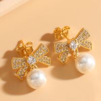 1 Pair Elegant Classic Style Bow Knot Asymmetrical Inlay Copper Zircon 14k Gold Plated Drop Earrings sku image 2