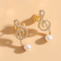1 Pair Elegant Classic Style Bow Knot Asymmetrical Inlay Copper Zircon 14k Gold Plated Drop Earrings sku image 3