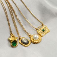 Stainless Steel 18K Gold Plated Retro Plating Inlay Oval Eye Gem Pearl Pendant Necklace Long Necklace main image 2