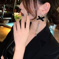Simple Style Bow Knot Metal Inlay Rhinestones Women's Drop Earrings main image 3