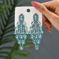 1 Pair Elegant Vacation Leaves Hollow Out Inlay Copper Alloy Artificial Gemstones Drop Earrings main image 2
