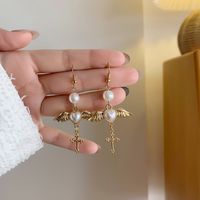 Ethnic Style Wings Alloy Plating Inlay Artificial Pearls Women's Drop Earrings Ear Clips main image 2