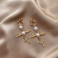Ethnic Style Wings Alloy Plating Inlay Artificial Pearls Women's Drop Earrings Ear Clips sku image 2