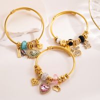 304 Stainless Steel Alloy Gold Plated Cute Romantic Sweet Beaded Plating Inlay Devil'S Eye Bear Artificial Crystal Bangle main image 1