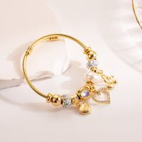 Artistic Shiny Heart Shape Alloy Titanium Steel Plating Inlay Rhinestones Gold Plated Bangle main image 4