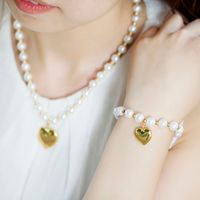 Acier Inoxydable Perle Artificielle Plaqué Or 18K Élégant Perlé Forme De Cœur Bracelets Des Boucles D'Oreilles Collier main image 3
