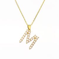 Modern Style Cross Letter Devil's Eye Copper Gold Plated Pearl Zircon Pendant Necklace In Bulk sku image 2
