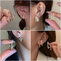 1 Pair Simple Style Solid Color Inlay Copper Zircon Ear Studs main image 2
