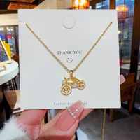 Cute Novelty Bicycle Titanium Steel Plating Inlay Artificial Pearls Zircon Gold Plated Pendant Necklace main image 6