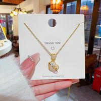 Elegant Brief Herzform Titan Stahl Überzug Inlay Künstliche Perlen Zirkon Vergoldet Halskette Mit Anhänger main image 1