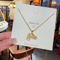 Cute Novelty Bicycle Titanium Steel Plating Inlay Artificial Pearls Zircon Gold Plated Pendant Necklace main image 4