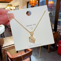 Elegant Brief Herzform Titan Stahl Überzug Inlay Künstliche Perlen Zirkon Vergoldet Halskette Mit Anhänger main image 3
