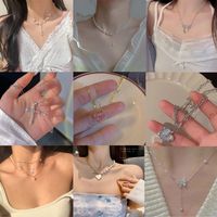 Sweet Heart Shape Butterfly Bow Knot Alloy Plating Inlay Artificial Pearls Rhinestones Opal Women's Necklace main image 1