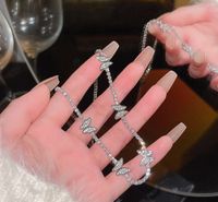 Estilo Simple Nudo De Lazo Cobre Embutido Diamantes De Imitación Pulsera Aretes Collar sku image 26