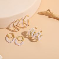 1 Pair Elegant Luxurious Classic Style U Shape Round Asymmetrical Inlay Copper Pearl Zircon 14k Gold Plated Ear Studs main image 9